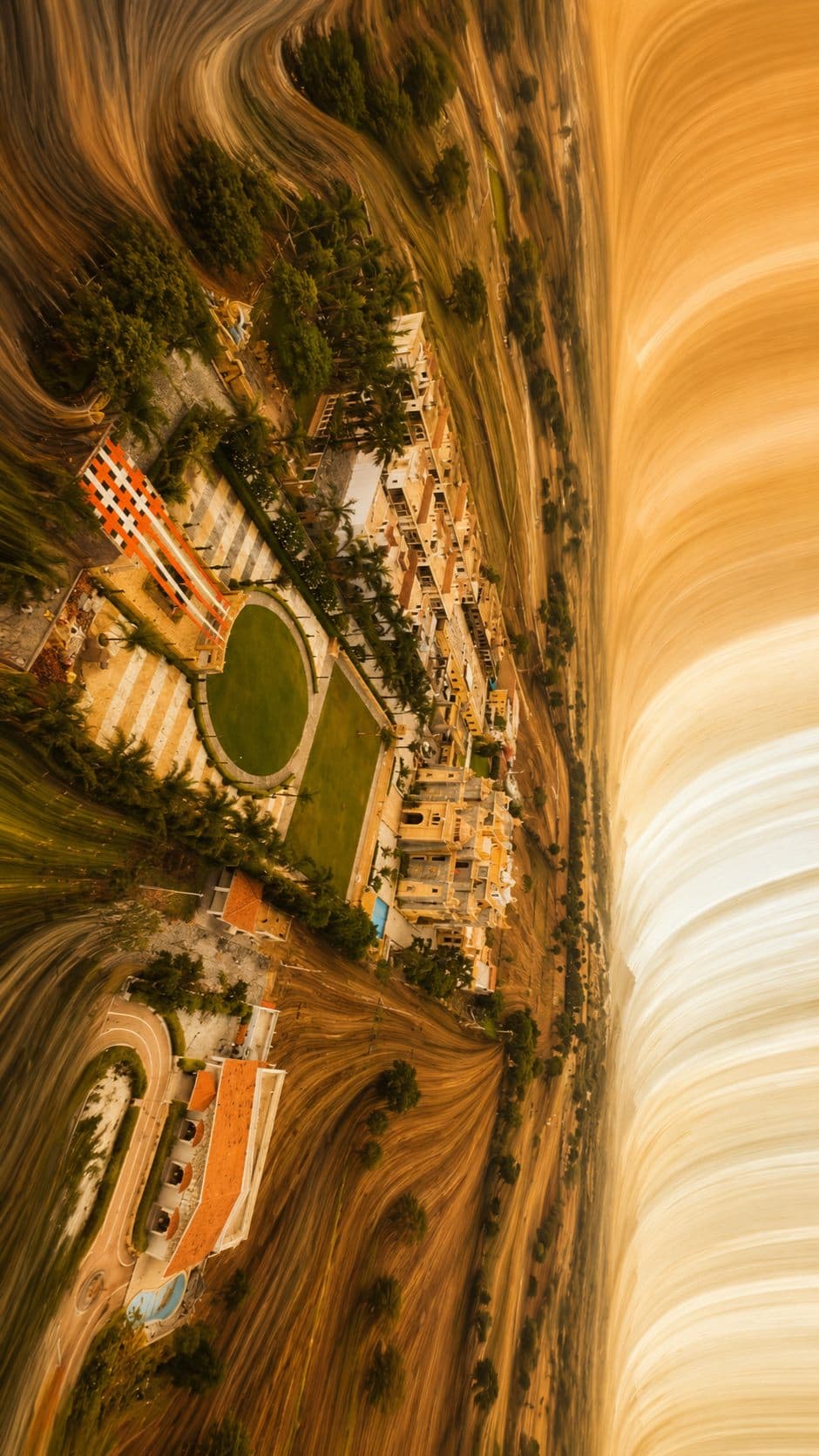 The resort as a tiny planet, shot from the drone at height